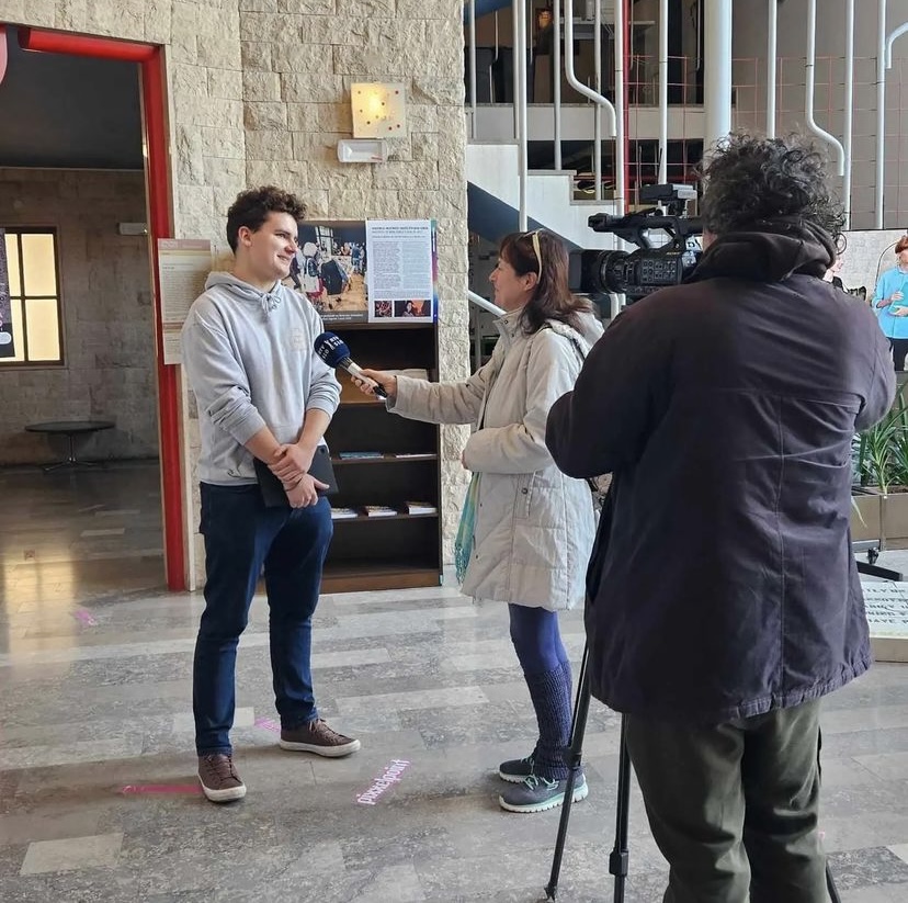 A student being interviewed by the national TV